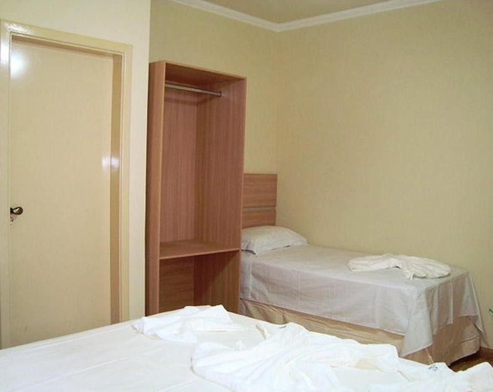 Hotel Perez Pouso Alegre Rum bild